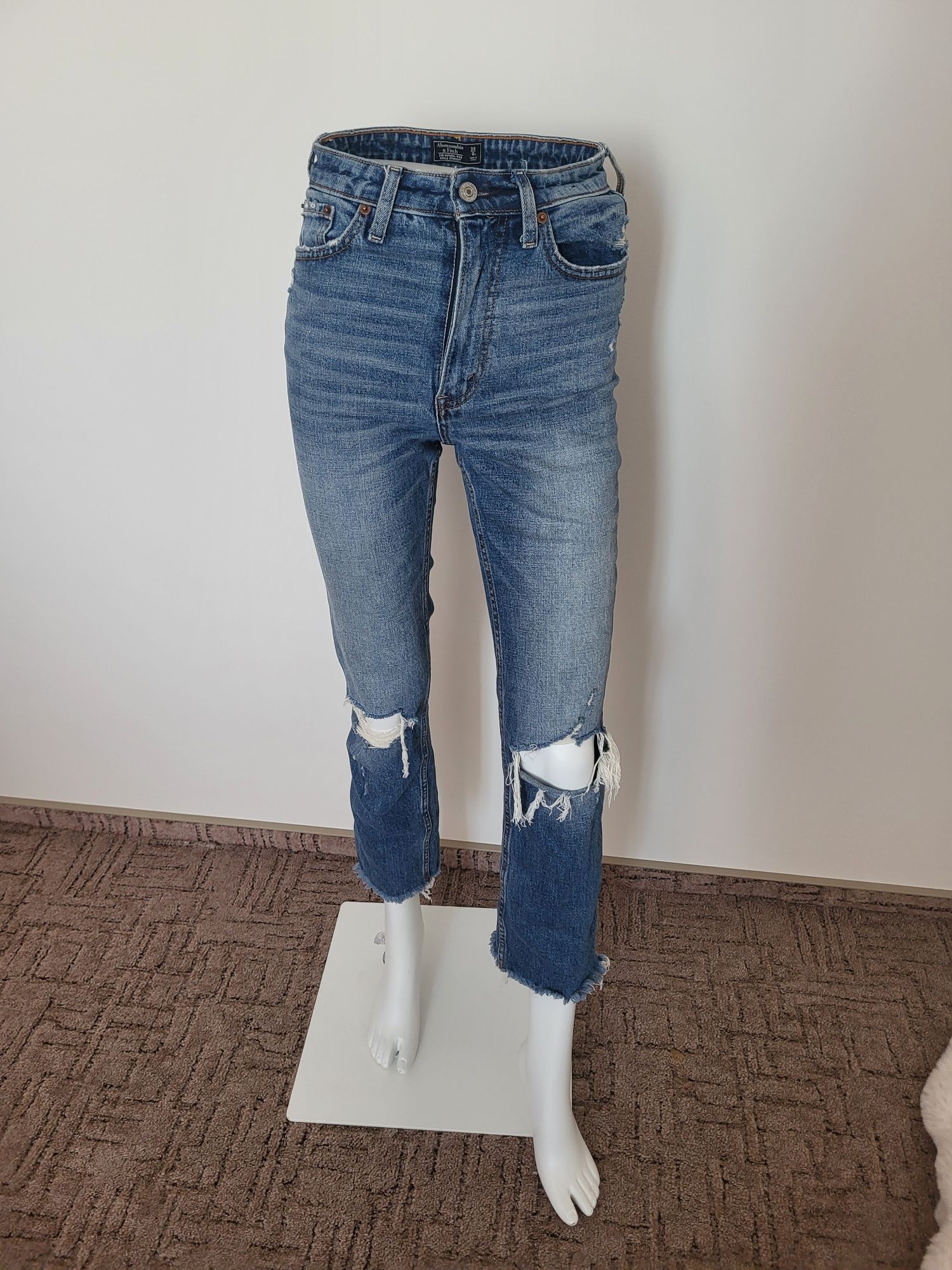 Ciemne niebieskie jeansy z wysokim stanem dziurami przetarciami 34 XS