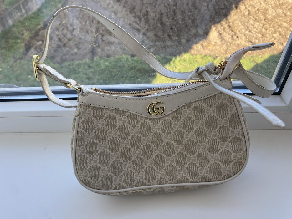 Сумочки Гучі та Адідас