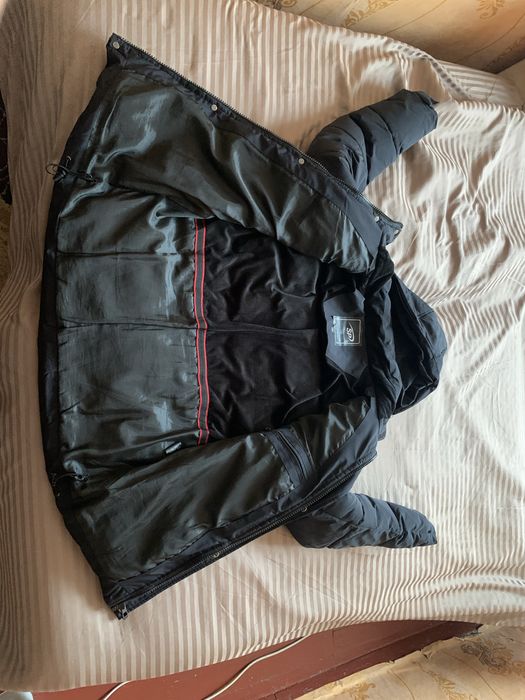 Куртка мужская,в отличном состоянии б/у. Nike зимняя,пуховик,размер 50