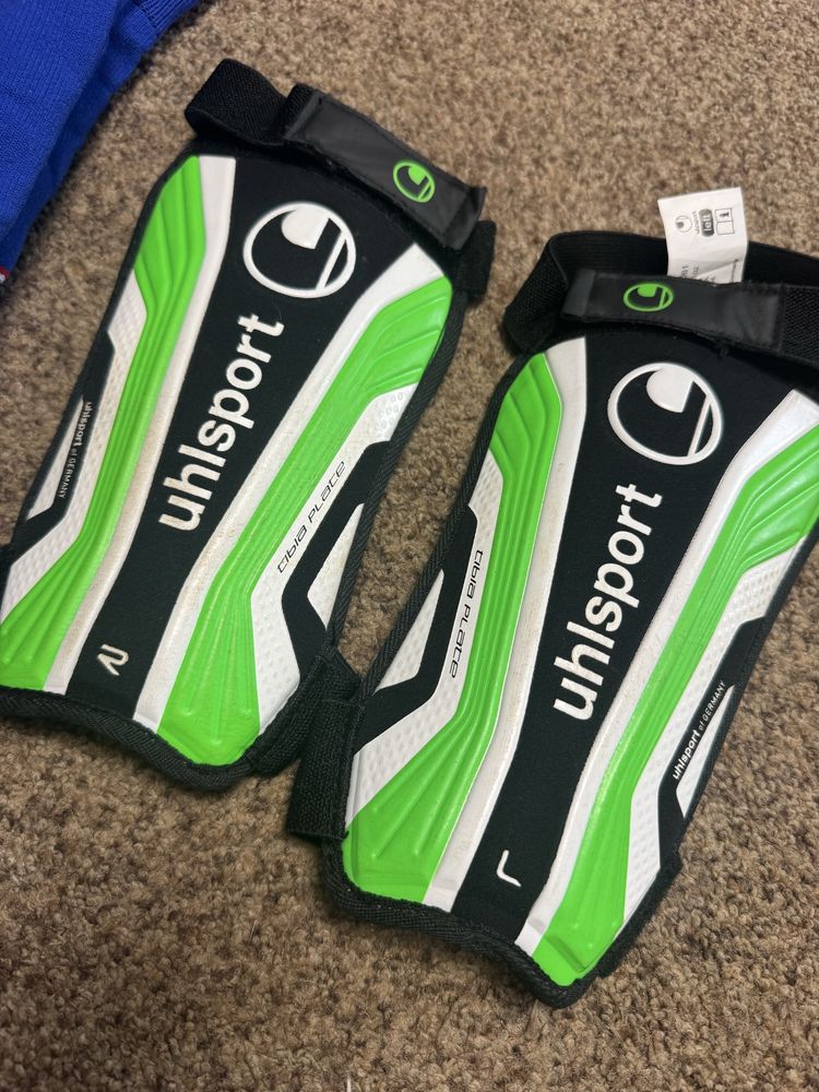 защита для ног футбол EN 13061 left uhlsport