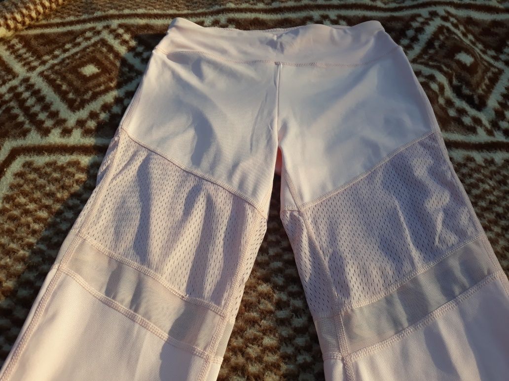 Sportowe jasno różowe legginsy rozmiar z metki xl 42 pasuje też na  40