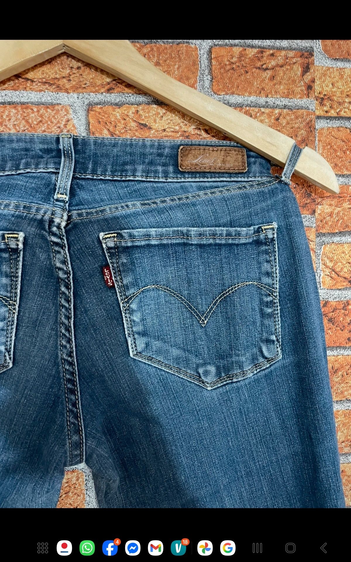 Dżinsy biodrówki damskie Levis