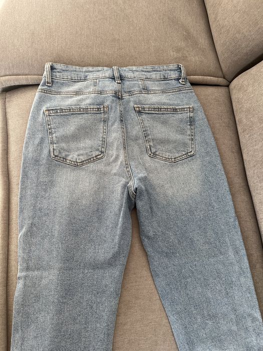 Джинси кльош з розрізом М 46