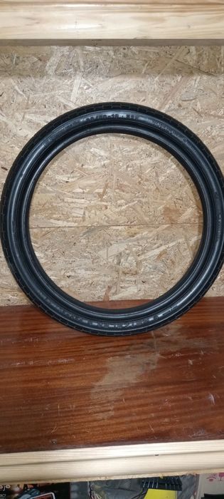 Два блоки двигуна моиоцикла Урал , Передня мото гума Metzeler 90/90-19