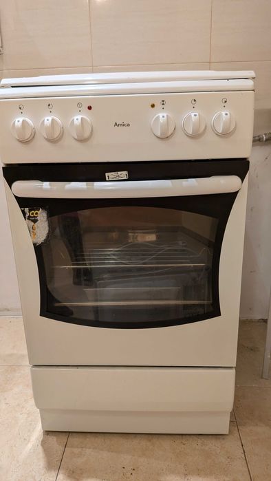 Kuchenka gazowa z elektrycznym piekarnikiem Amica