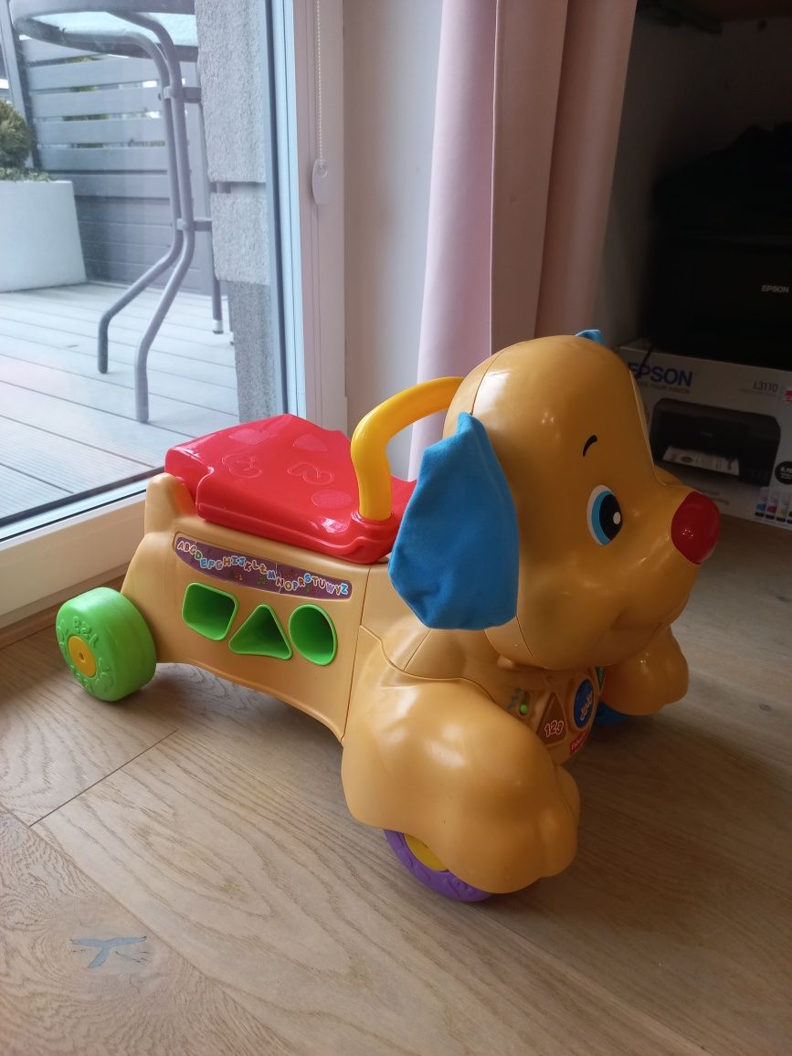Chodzik jeździk szczeniaczka uczniaczka Fisher Price