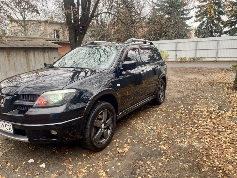 митсубиси Аутлендер 2.4 газ бензин автомат