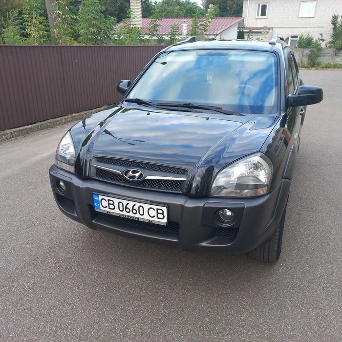 Hyundai Tucson, I покоління  2.0 DOHC МТ (142 к.с.) 4WD  Base