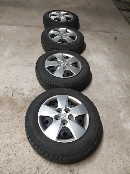 Sprzedam koła wraz z oponami zimowymi i kołpakami rozm 195/65 R 15