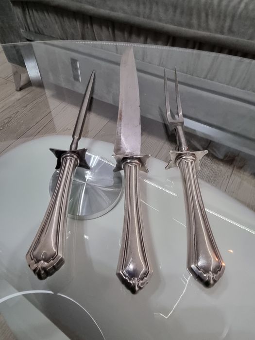 Posrebrzany i sygnowany zestaw sztućców