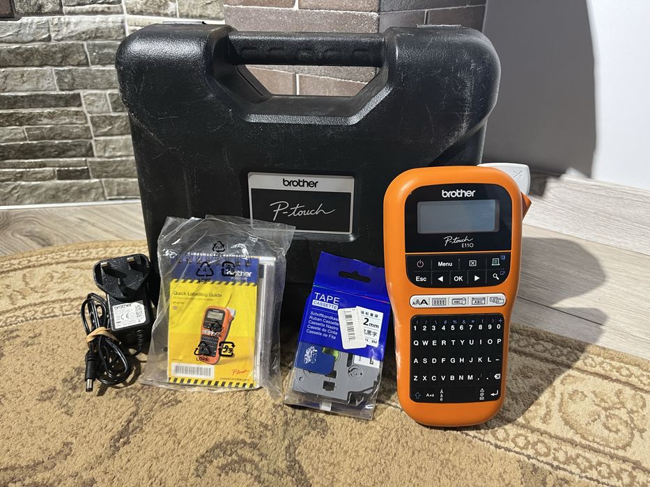 Принтер етикеток Brother P-touch E110VP OrangeПОВНИЙ КОМПЛЕКТ З АНГЛІЇ