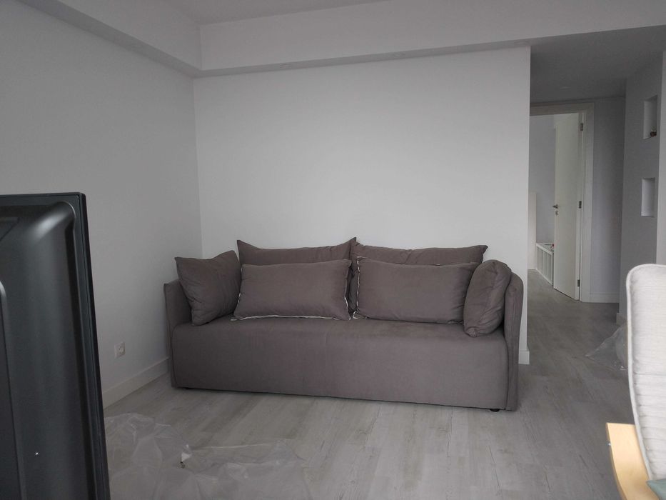 Sofá 3 lugares com almofadas soltas