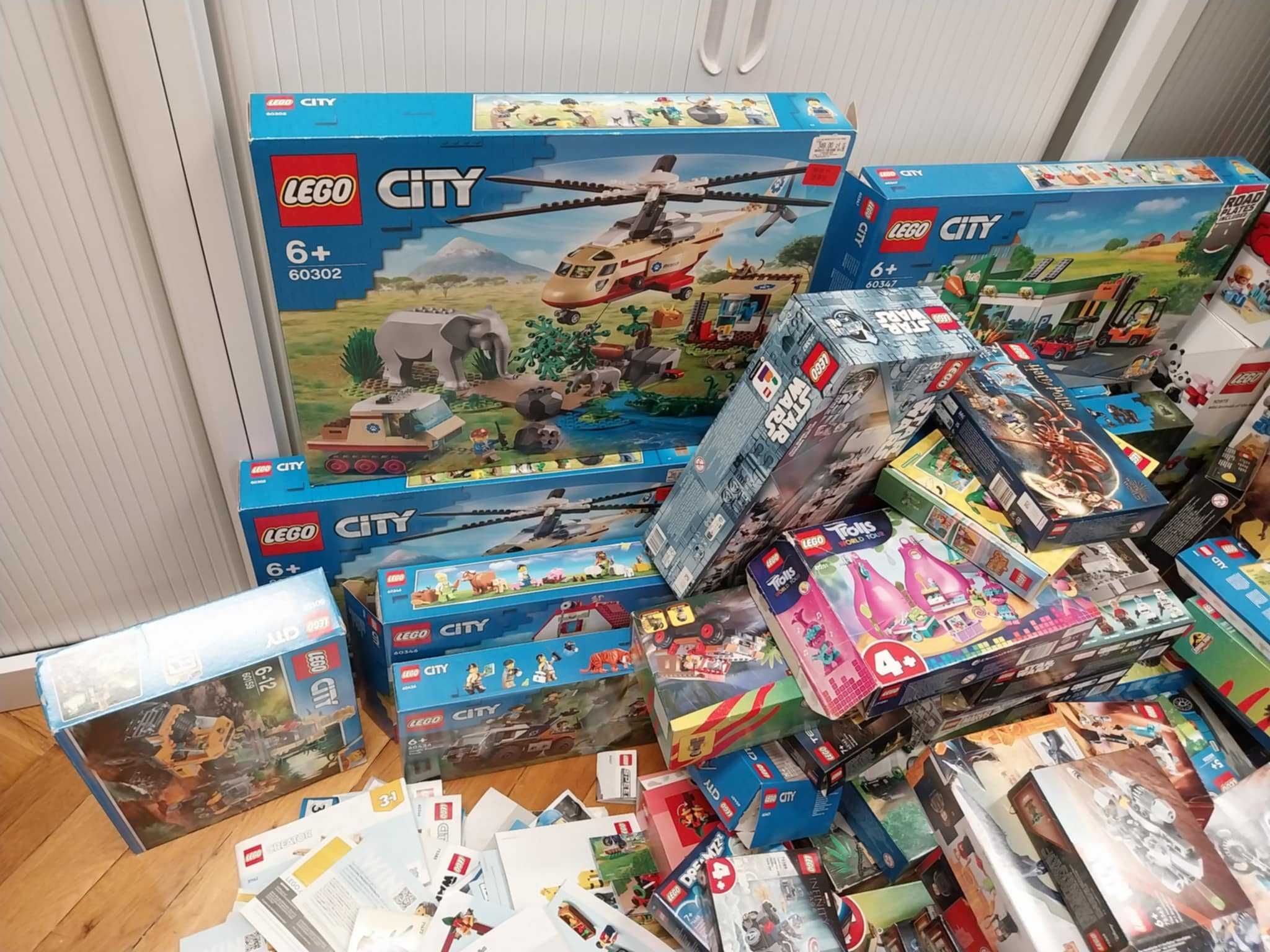 pudełka i instrukcje od zestawów Lego