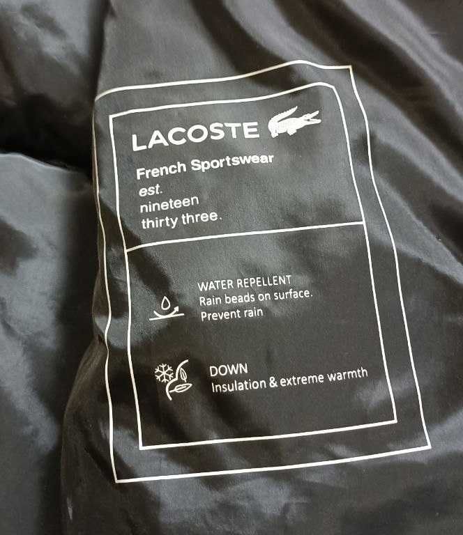 Пуховик від бренду lacoste originals