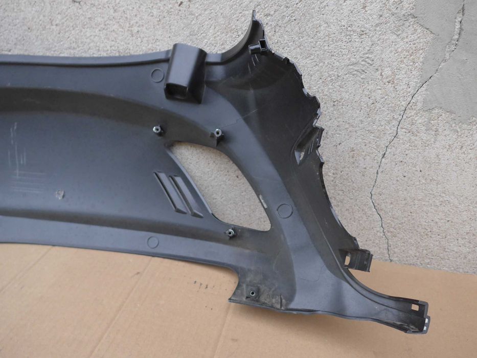 Sym Fiddle II '08-14r OWIEWKA prawy tył emblemat