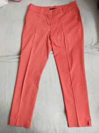 Pomarańczowe spodnie Reserved