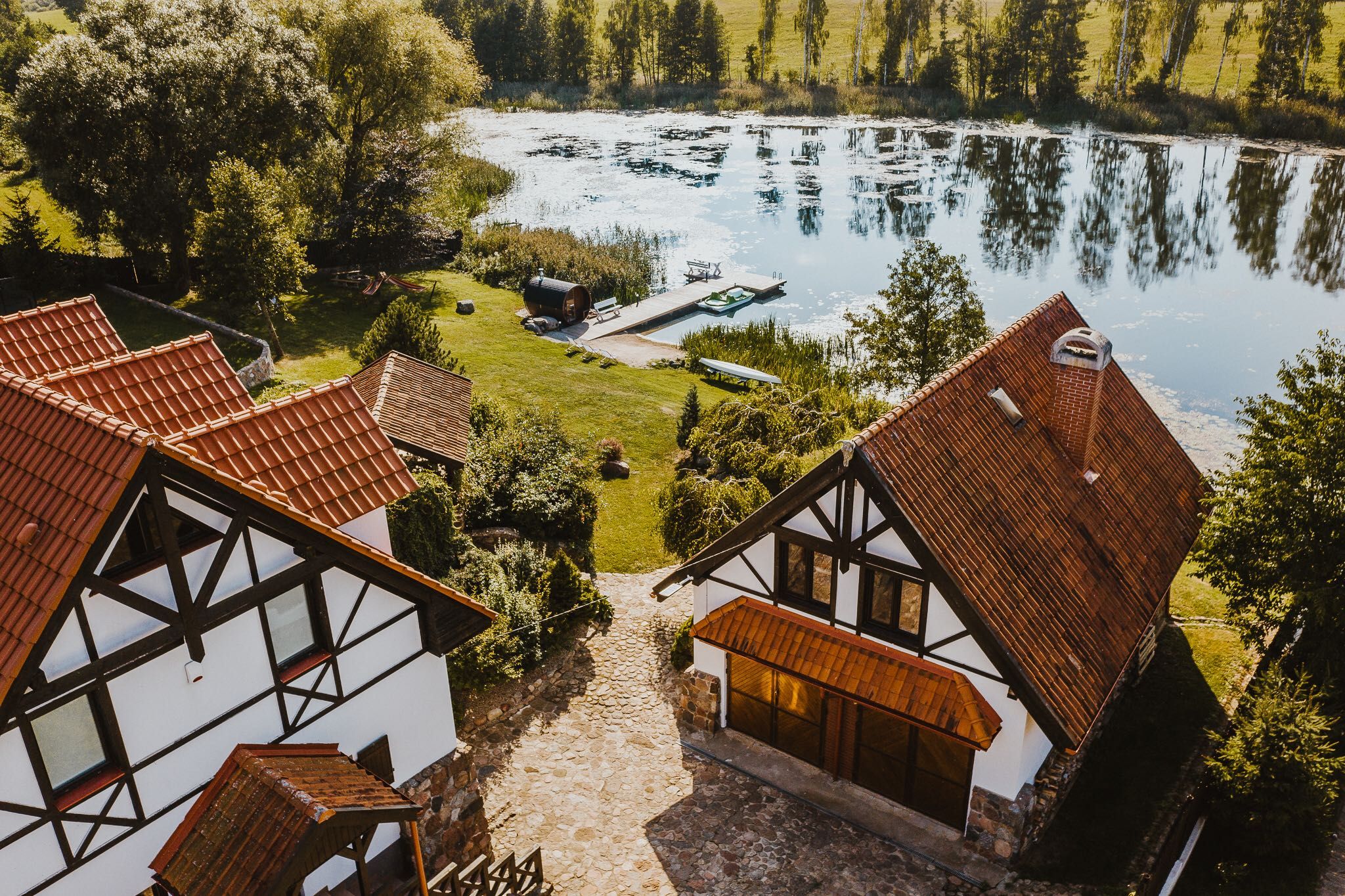 Duży dom linia brzegowa wynajem Mazury pomost sauna agroturystyka