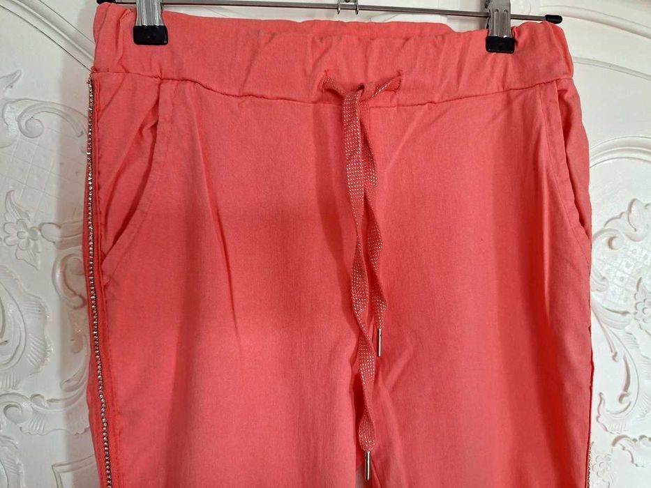 Spodnie letnie tzw. gnieciuchy XL/42 kolor łososiowy
