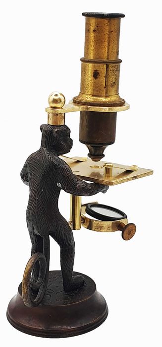 Brass reproduction of a “monkey microscope”