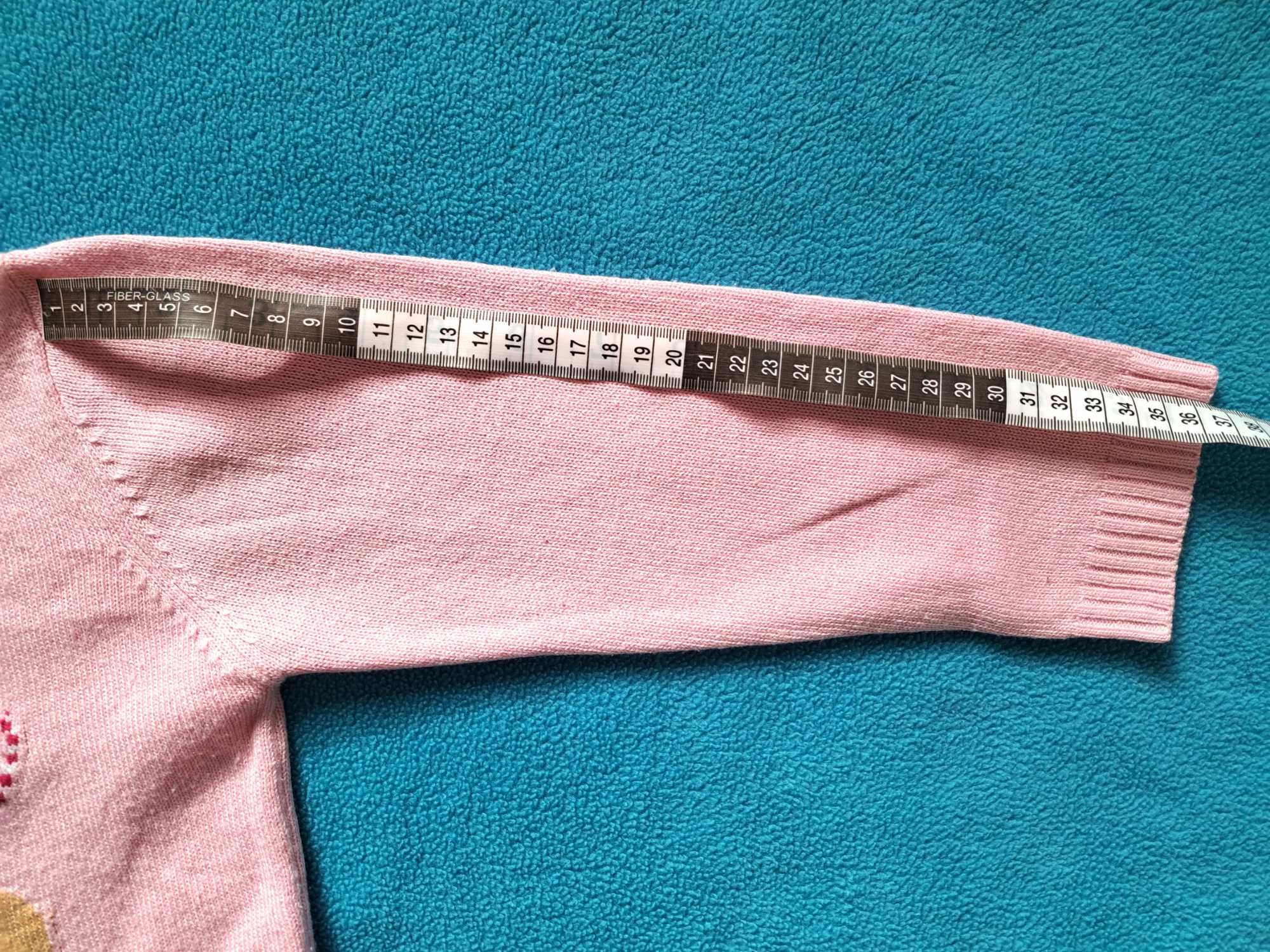 Różowy sweter z piernikiem 122