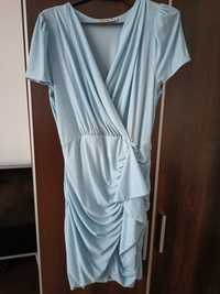 Nowa sukienka brokatowa jasny niebieski roz 44