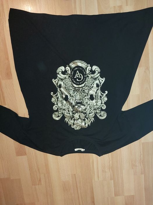 Dłuższa bluzka tunika z złotym lwem 50 5xl bawełna czarna plus size du