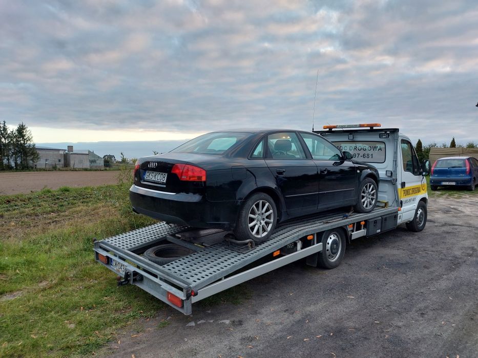 Autolaweta autoholowanie pomoc drogowa laweta transport niskopodwozie