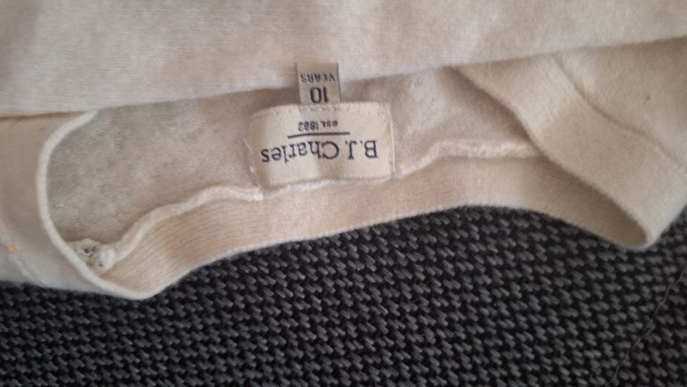 Sweterek B.J.Charles dla dziewczynki 134/140 Lanamerino ecru