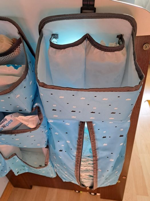 Organizery na łóżeczko