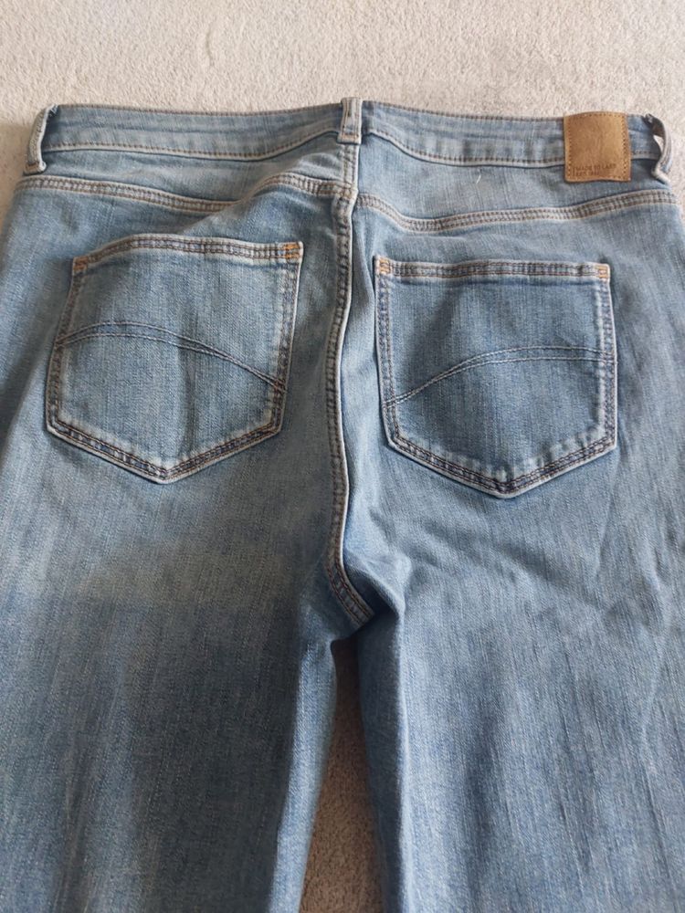 Spodnie damskie jeansowe C&A, rozmiar 38, dzwonowate na dole
