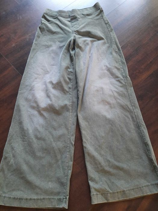 Dwie pary spodni jeansów marki H&M oraz Pepperts r. 158