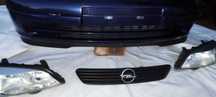 lampy przód + zderzak + grill do Opel Astra