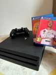 Playsation 4 (1 TB, Pro) com um comando e um jogo (fifa 20)
