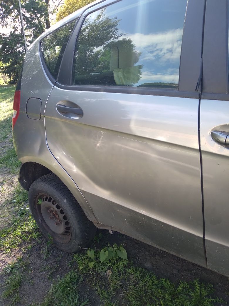Drzwi lewe prawe przod tyl kol 748 mercedes a klasa w169  maska klapa