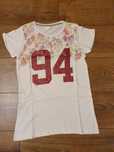 Biała kwiecista brokatowa bluzka T-shirt dziewczęca 158/164 cm pepco