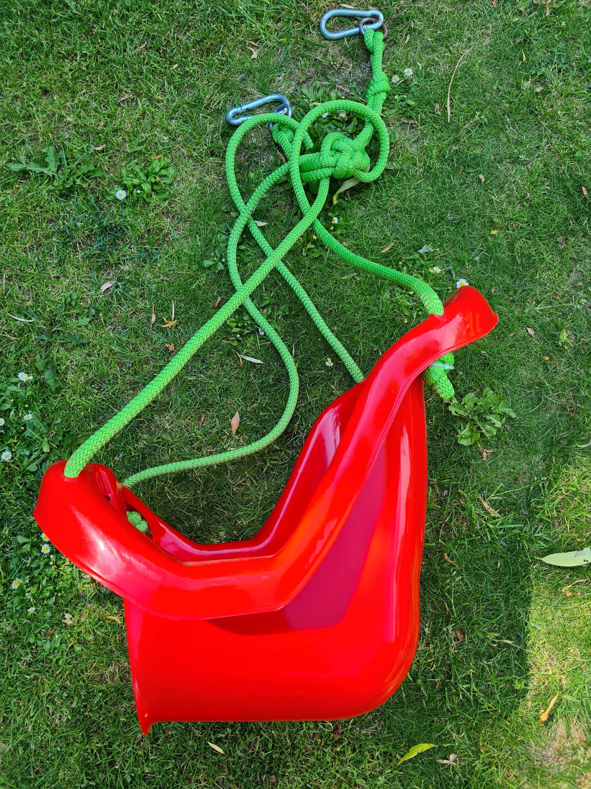 Czerwona huśtawka krzesełko bączek plastikowa do 20 kg dla dzieci