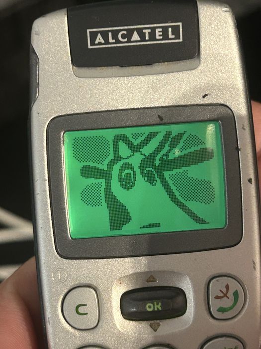 Telefon retro - Alcatel z pokrowcem i ładowarką