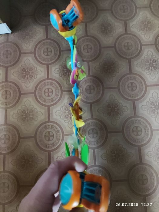 Дитяча іграшка на коляску