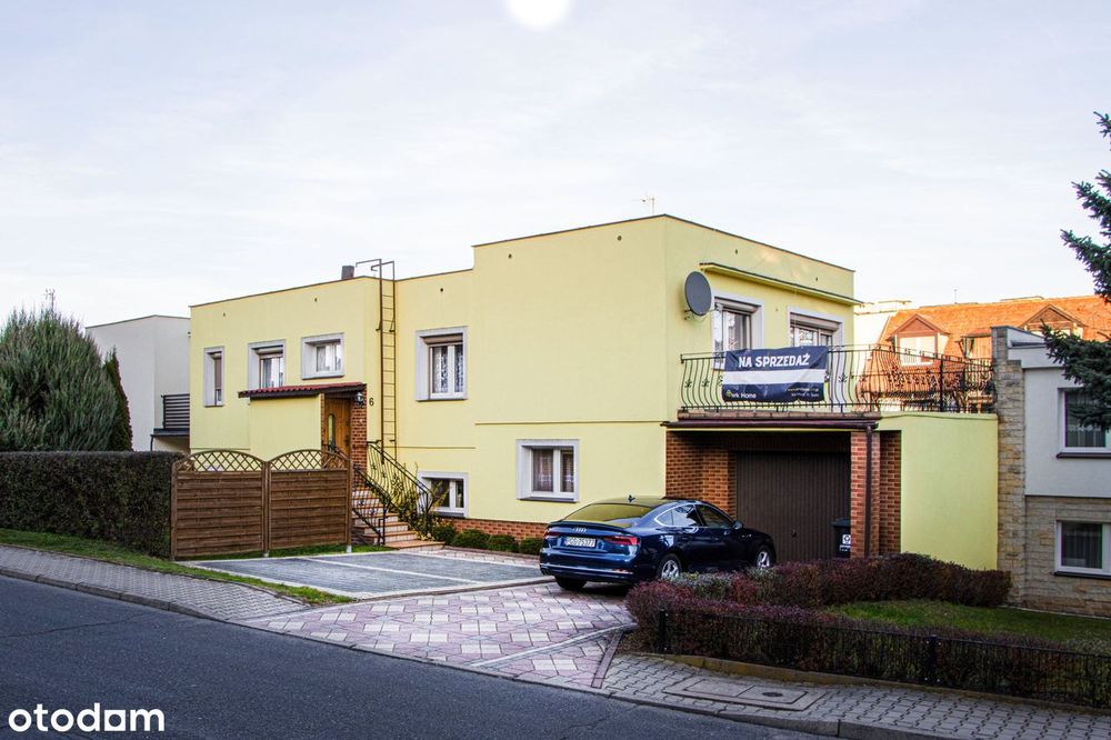 Przytulny dwukondygnacyjny dom z garażem i ogrodem w Gostyniu