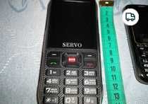 4 сим телефон Servo