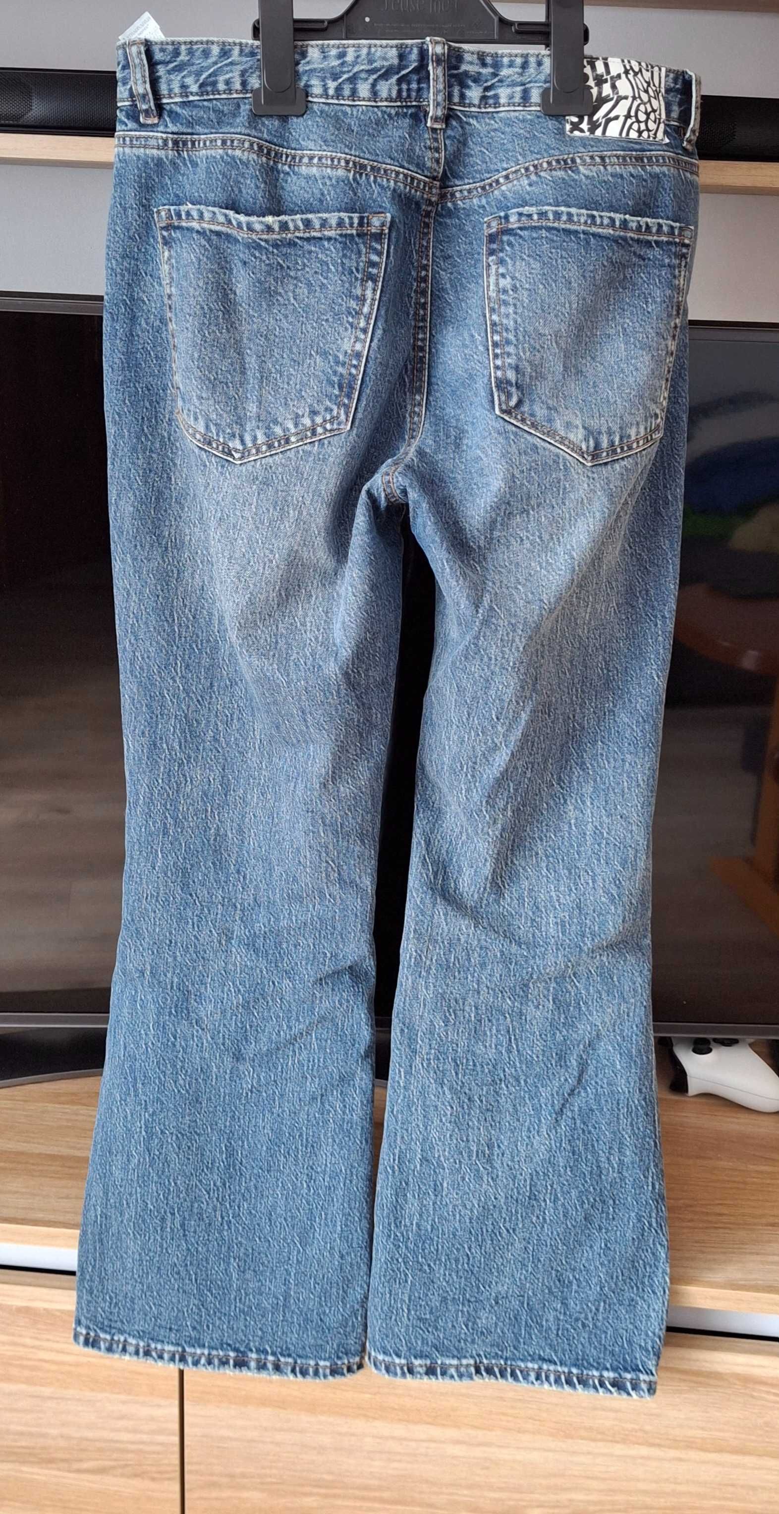 Spodnie jeansy damskie dzwony 40 Stradivarius