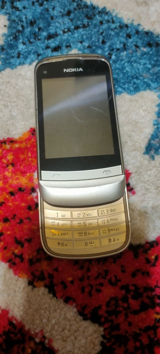 Nokia C2-06 полусенсорний