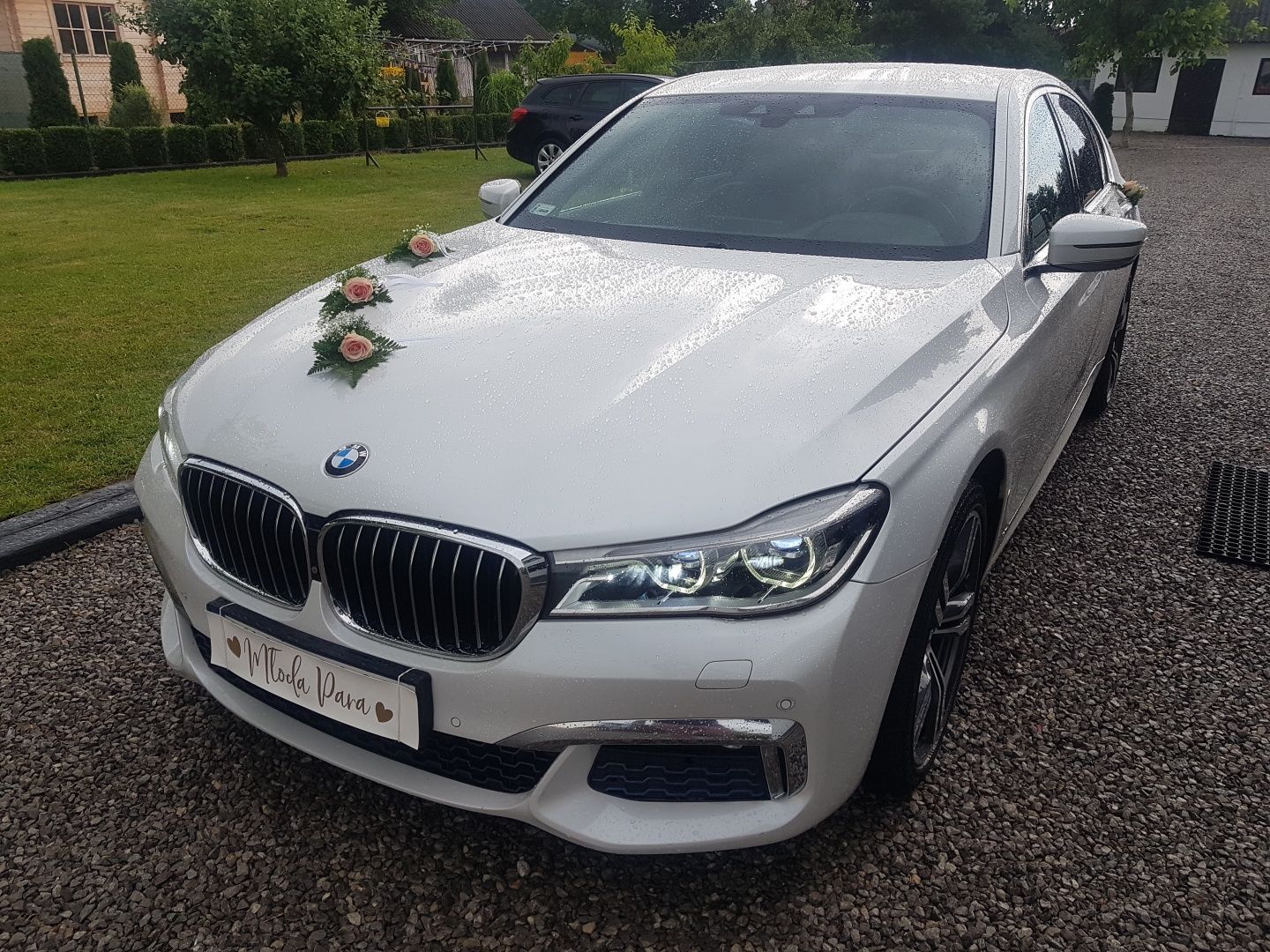 BMW 7 biała perła limuzyna auto do ślubu wynajem samochód