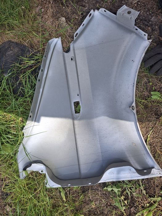 Vw Transporter T6 Multivan błornik lewy przod ladny