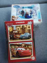 Dwa zestawy puzzle frozen oraz cars
