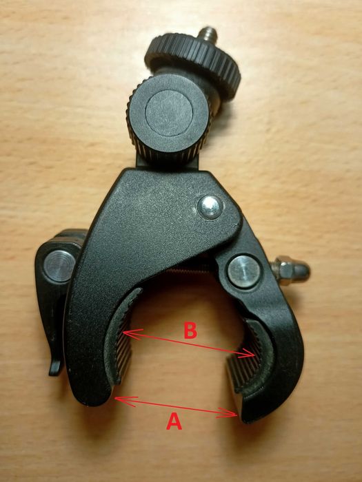 Кріплення аксесуарів на кермо або раму