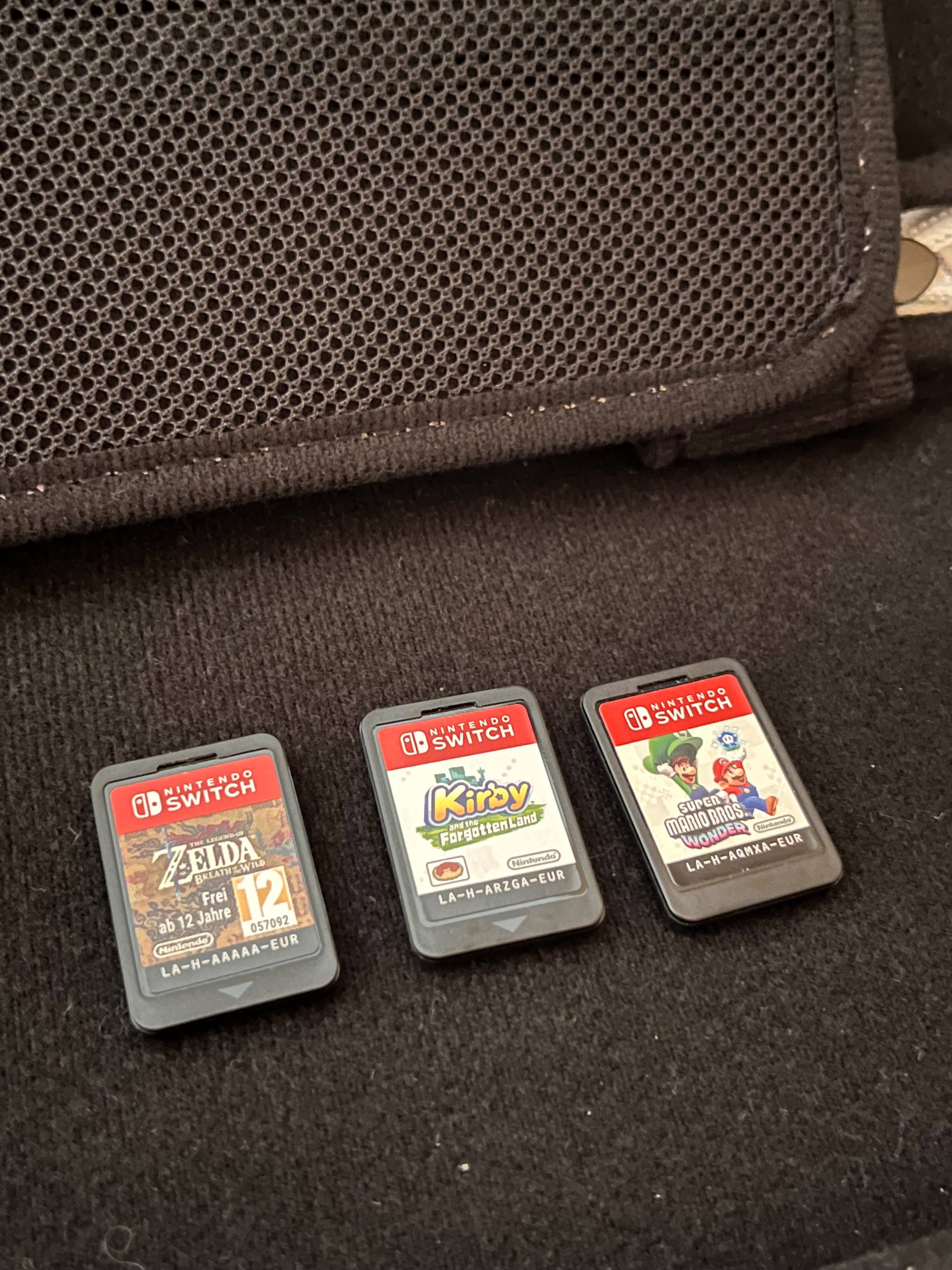 Nintendo Switch OLED + Bolsa + 2 joycons + 3 jogos fisicos