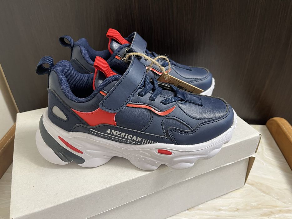 Продам  нові кросівки для хлопчика,нові кросівки American club