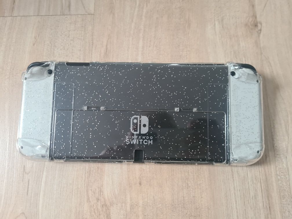 Nintendo switch oled+2etui+Pad 8bitdo+2joycony+ładowarka na 4joycony