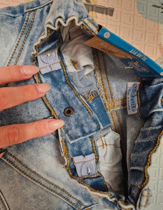 Nowe jeansy dziecięce 74
